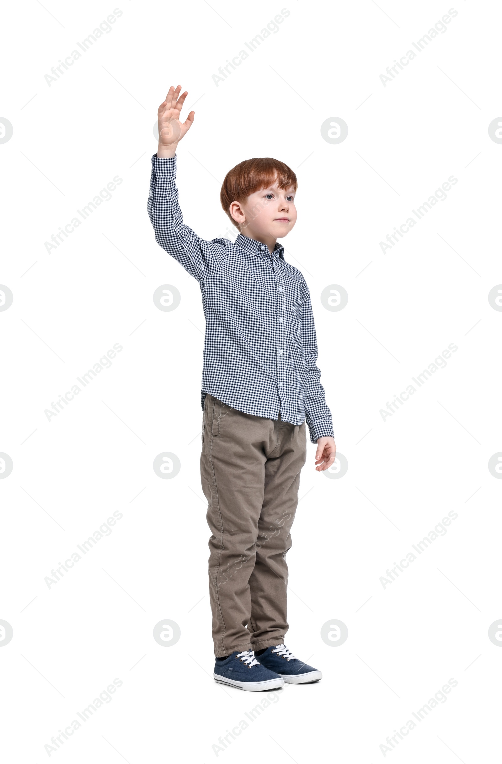 Photo of Little boy waving hand on white background