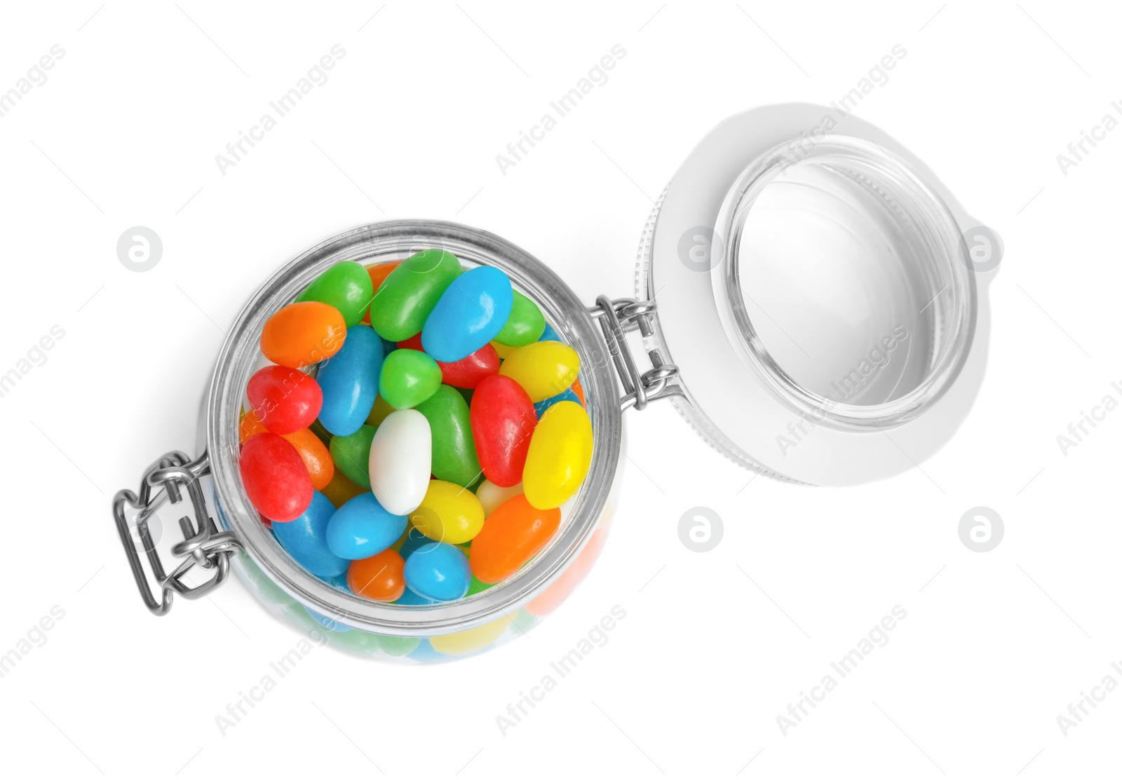 Photo of Jar of delicious color jelly beans isolated on white, top view