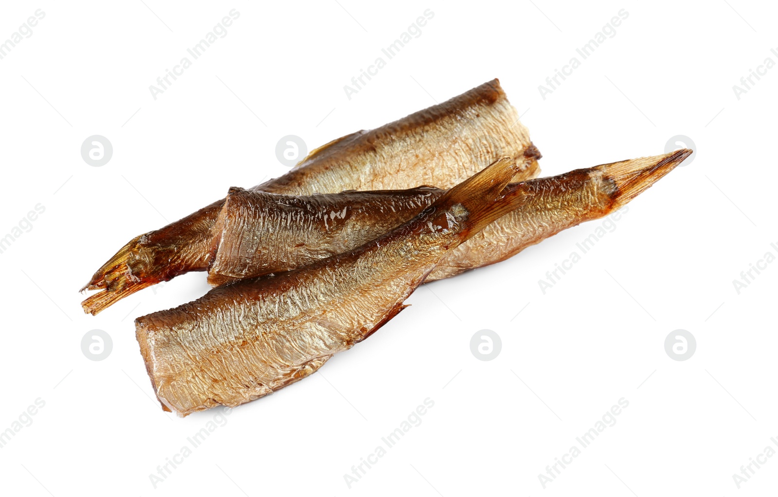 Photo of Many tasty canned sprats isolated on white