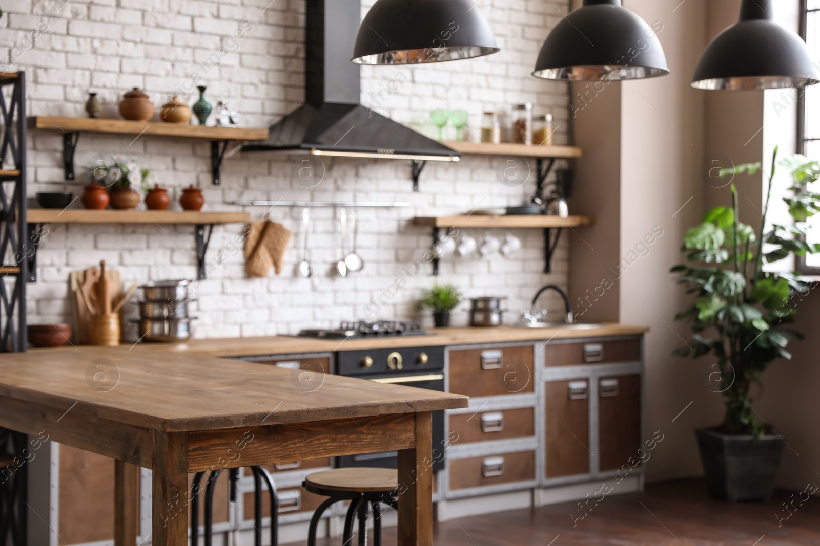 Photo of Beautiful kitchen interior with new stylish furniture