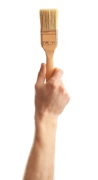 Man holding paintbrush on white background. Construction tools