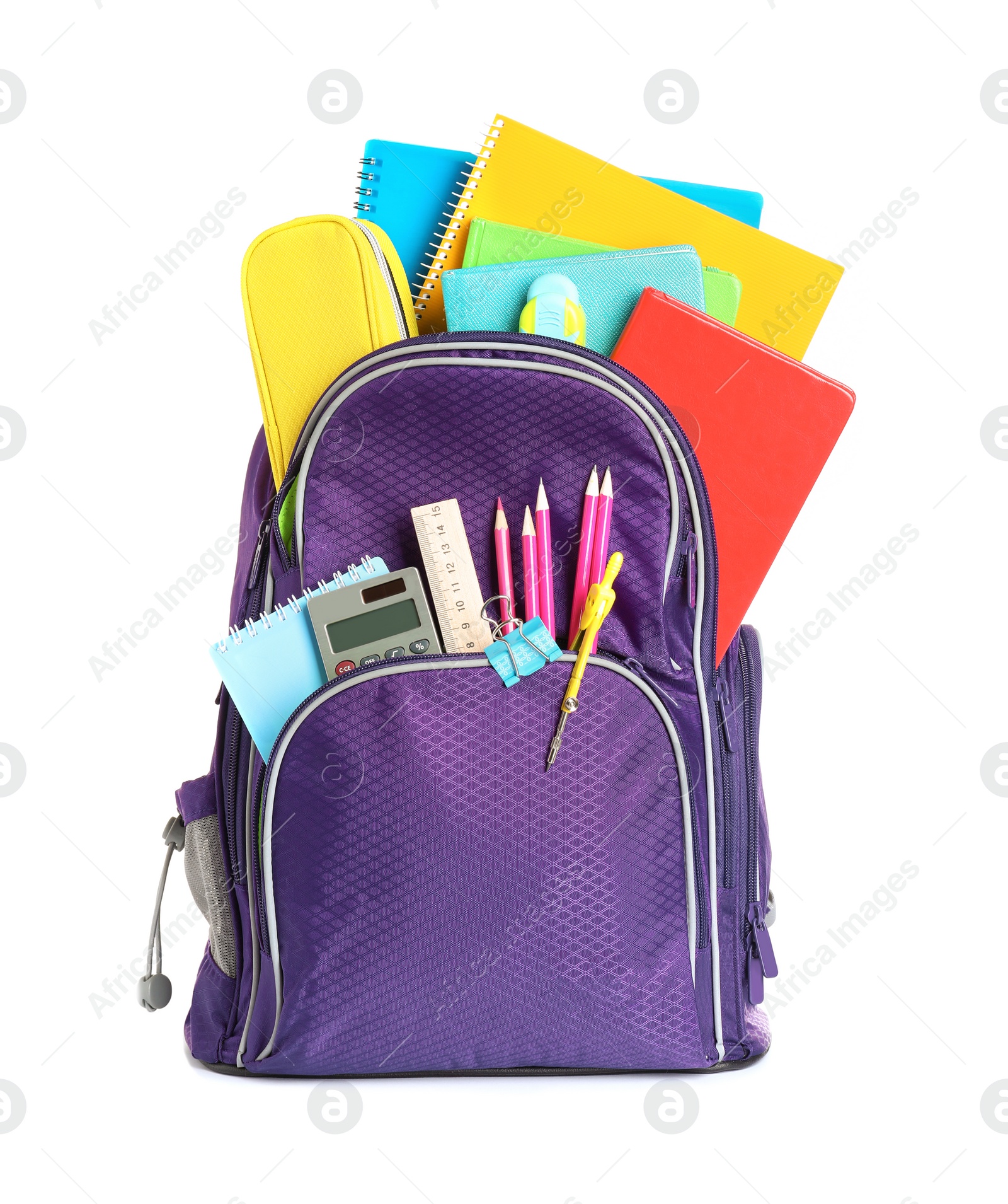 Photo of Color backpack with stationery on white background. Ready for school