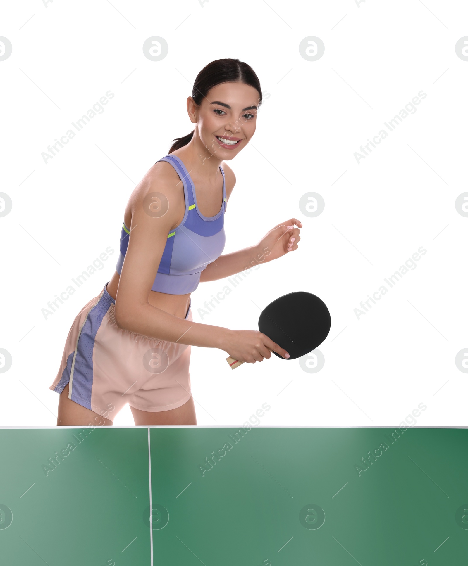 Photo of Beautiful young woman playing ping pong on white background