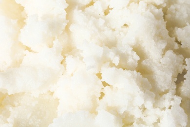 Photo of Fresh shea butter as background, top view. Cosmetic product