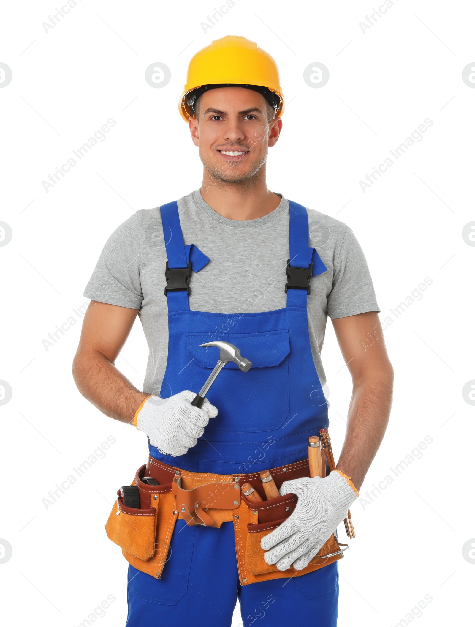 Photo of Handsome carpenter with hammer isolated on white