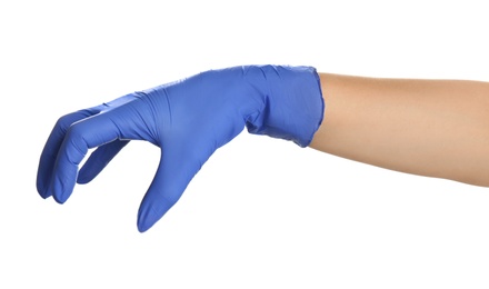 Woman in blue latex gloves holding something on white background, closeup of hand