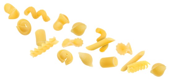 Different types of pasta flying on white background