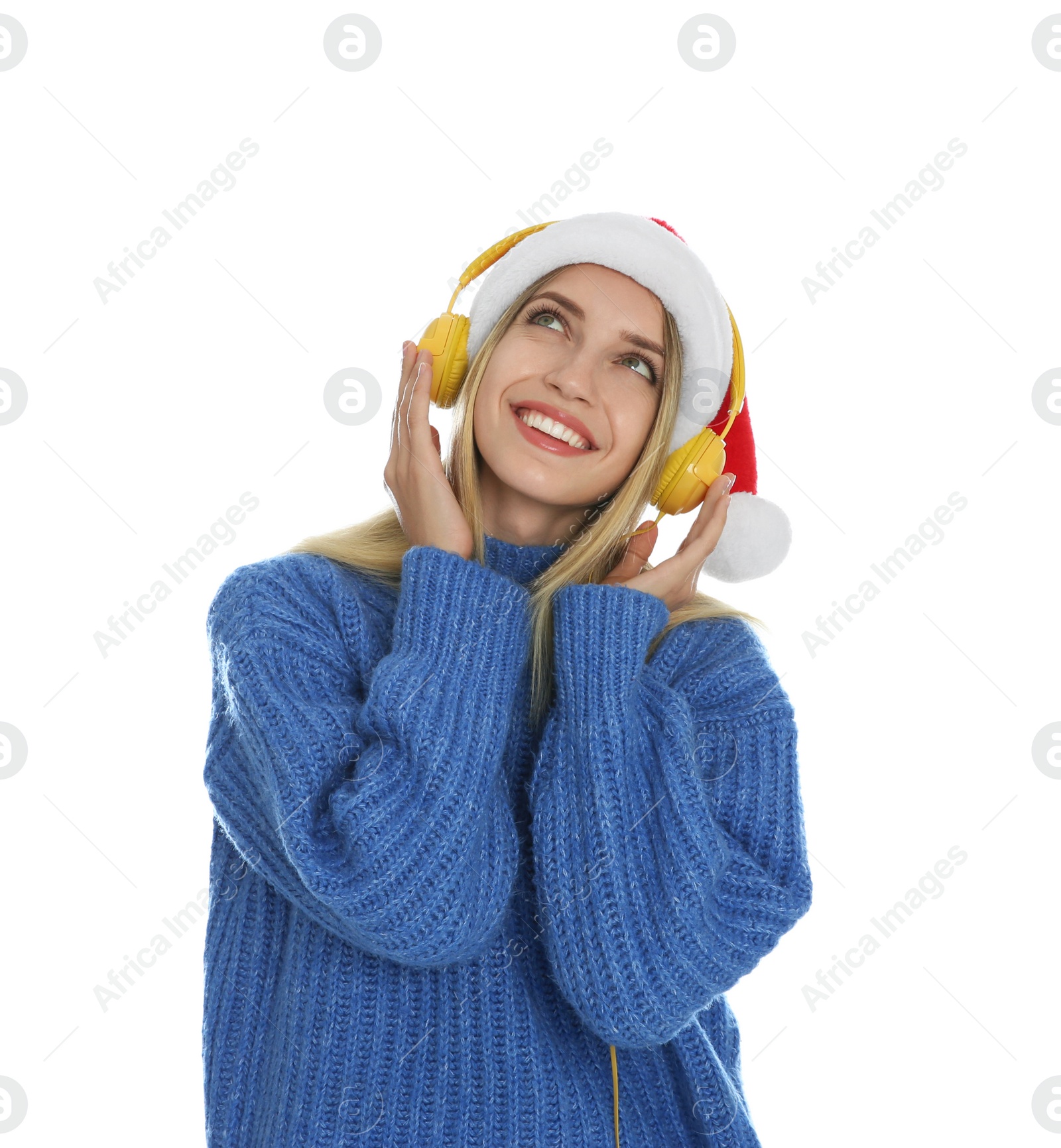 Photo of Happy woman with headphones on white background. Christmas music