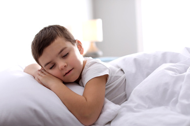 Photo of Cute little boy sleeping at home. Bedtime