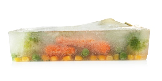 Photo of Fresh vegetables frozen in ice cube on white background