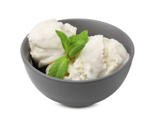 Delicious vanilla ice cream and mint leaves in bowl isolated on white