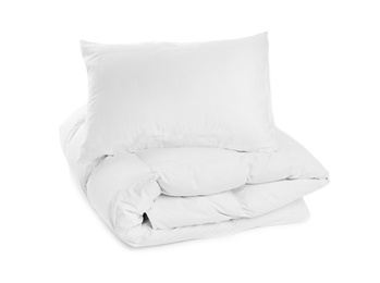 Photo of Clean blanket and pillow on white background