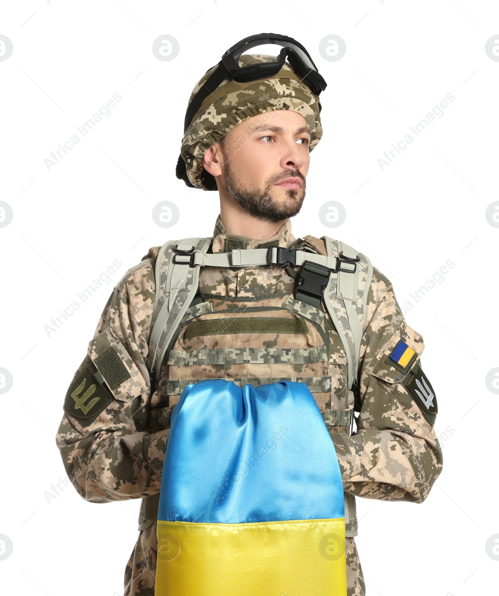 Photo of Soldier in military uniform with Ukrainian flag on white background