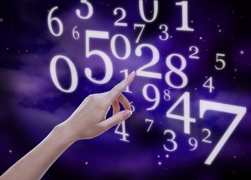 Image of Numerology. Woman pointing at numbers against sky, closeup