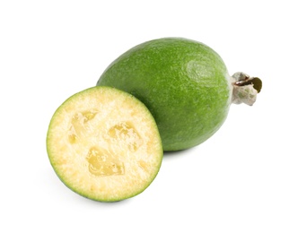 Photo of Whole and cut feijoa fruits on white background