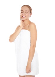 Photo of Portrait of young pretty woman with towel on white background