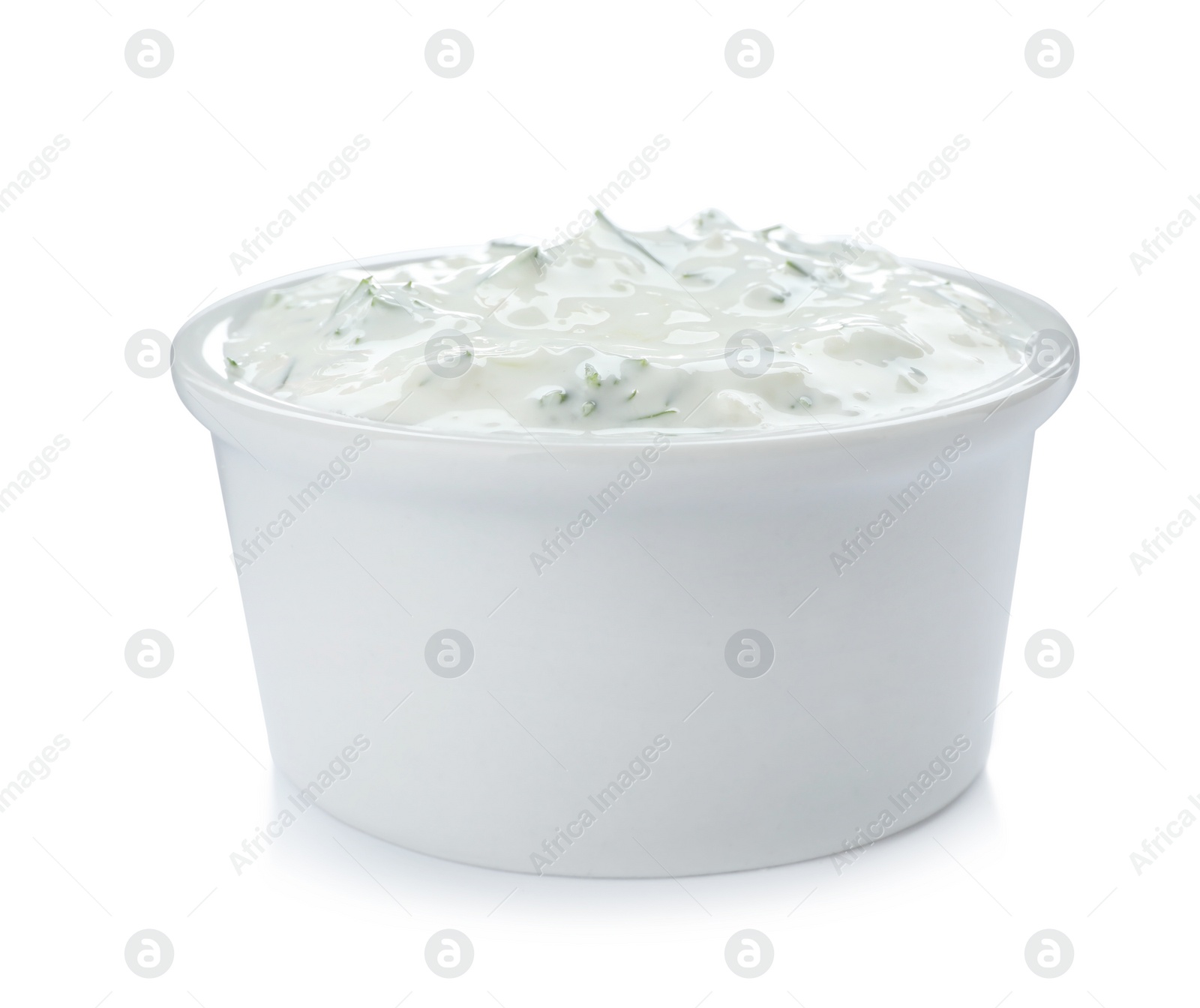 Photo of Bowl with cucumber sauce on white background