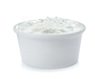 Photo of Bowl with cucumber sauce on white background