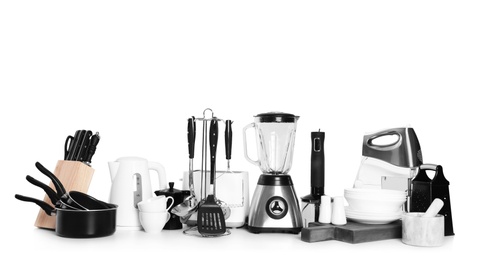 Photo of Set of clean cookware and appliances isolated on white