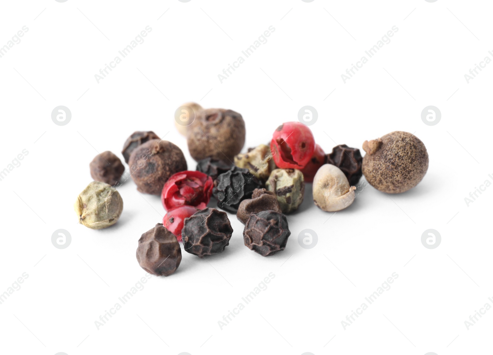 Photo of Mix of different pepper grains isolated on white