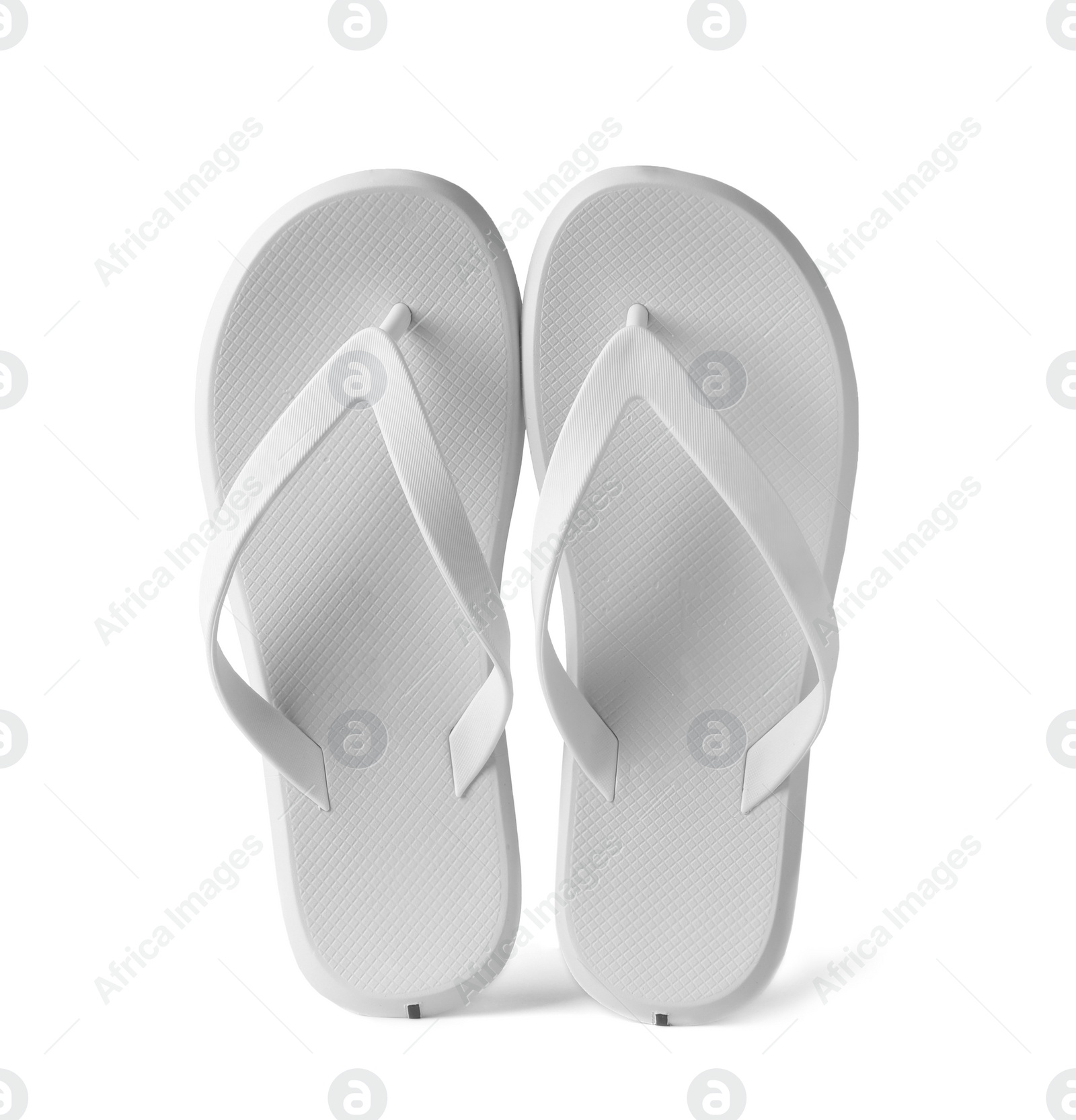 Photo of Stylish pair of flip flops on white background. Beach accessory