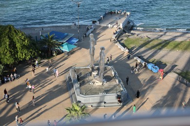 Photo of Batumi, Georgia - October 12, 2022: Ali and Nino sculpture near sea, above view