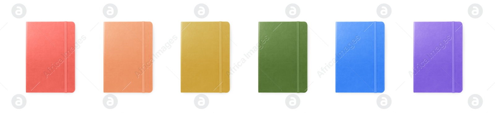 Image of Set with multicolor notebooks on white background, top view. Banner design