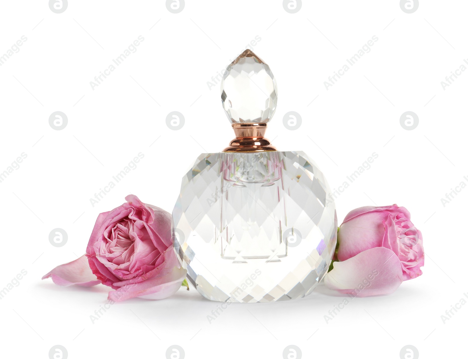 Photo of Bottle of luxury perfume and beautiful flowers isolated on white