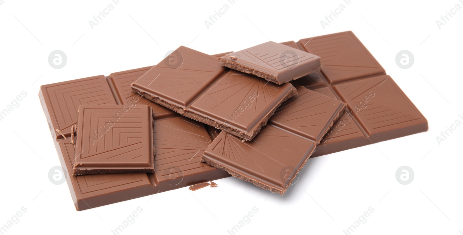 Photo of Broken milk chocolate bar on white background