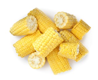 Pieces of corncobs on white background, top view