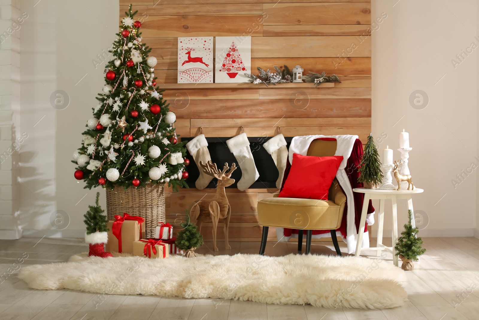 Photo of Beautiful Christmas themed photo zone. Cozy living room interior imitation