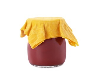 Photo of Jar of tomato paste covered with beeswax food wrap isolated on white