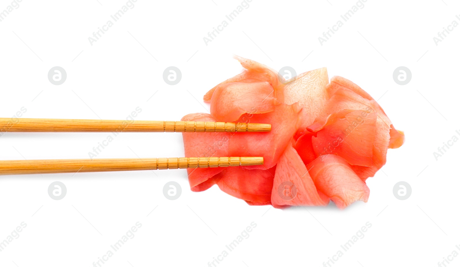 Photo of Chopsticks with pickled ginger on white background, top view