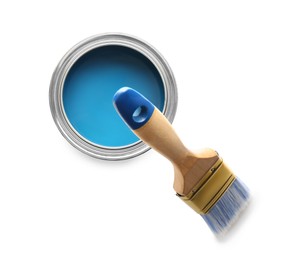 Photo of Can of blue paint and brush on white background, top view