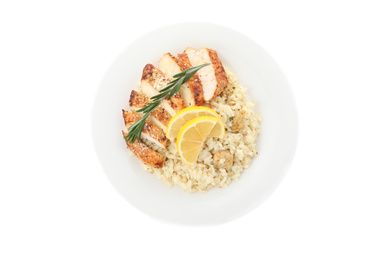 Photo of Delicious chicken risotto and lemon slices isolated on white, top view