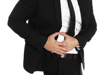 Photo of Businessman suffering from pain in right side on white background, closeup