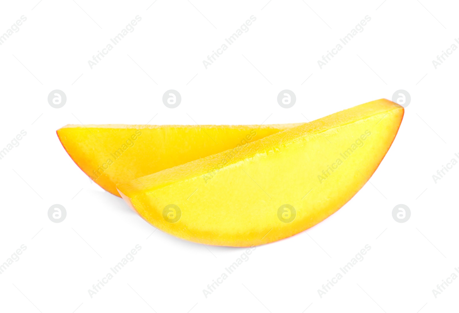 Photo of Juicy mango slices on white background. Tropical fruit