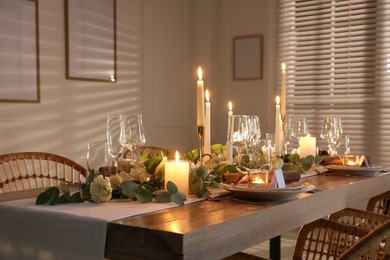 Festive table setting with beautiful tableware and decor indoors