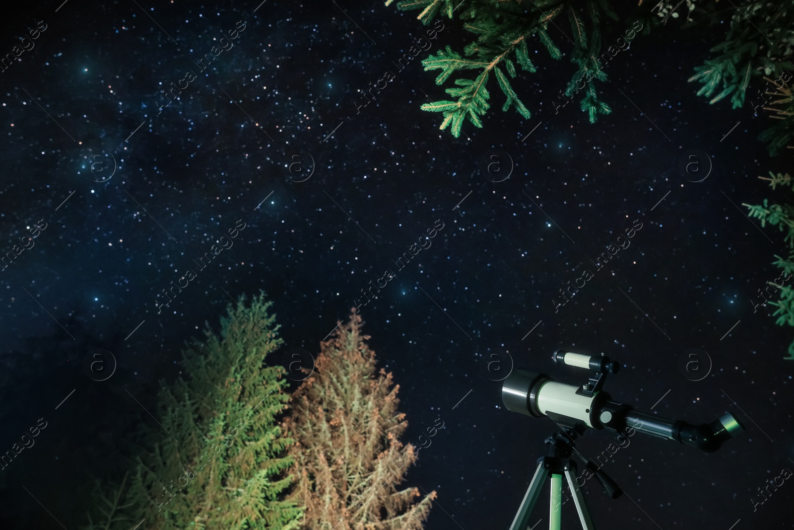 Photo of Modern telescope and beautiful sky in night outdoors. Learning astronomy