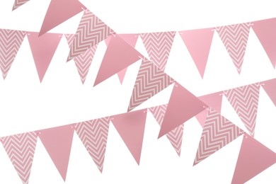 Photo of Rows of triangular bunting flags on white background. Festive decor