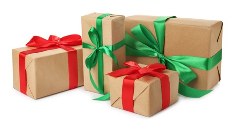 Photo of Different beautifully wrapped gift boxes on white background