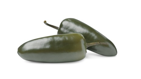 Photo of Pickled green jalapeno peppers on white background