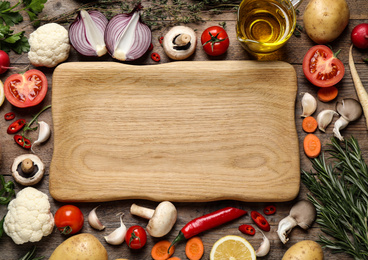 Photo of Flat lay composition with fresh products on wooden table, space for text. Healthy cooking