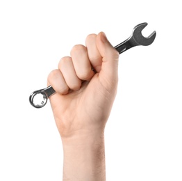 Photo of Man holding combination wrench isolated on white, closeup. Plumbing tools