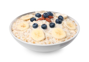 Photo of Tasty boiled oatmeal with banana, blueberries and almonds in bowl isolated on white