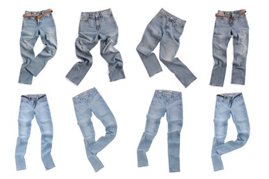 Image of Set with different jeans on white background, top view