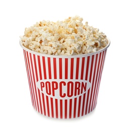 Photo of Carton bucket with delicious fresh popcorn on white background