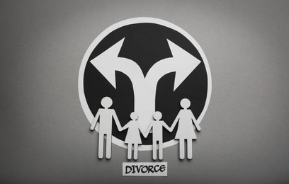 Photo of Word Divorce, arrows and paper cutout of family on light grey background, flat lay