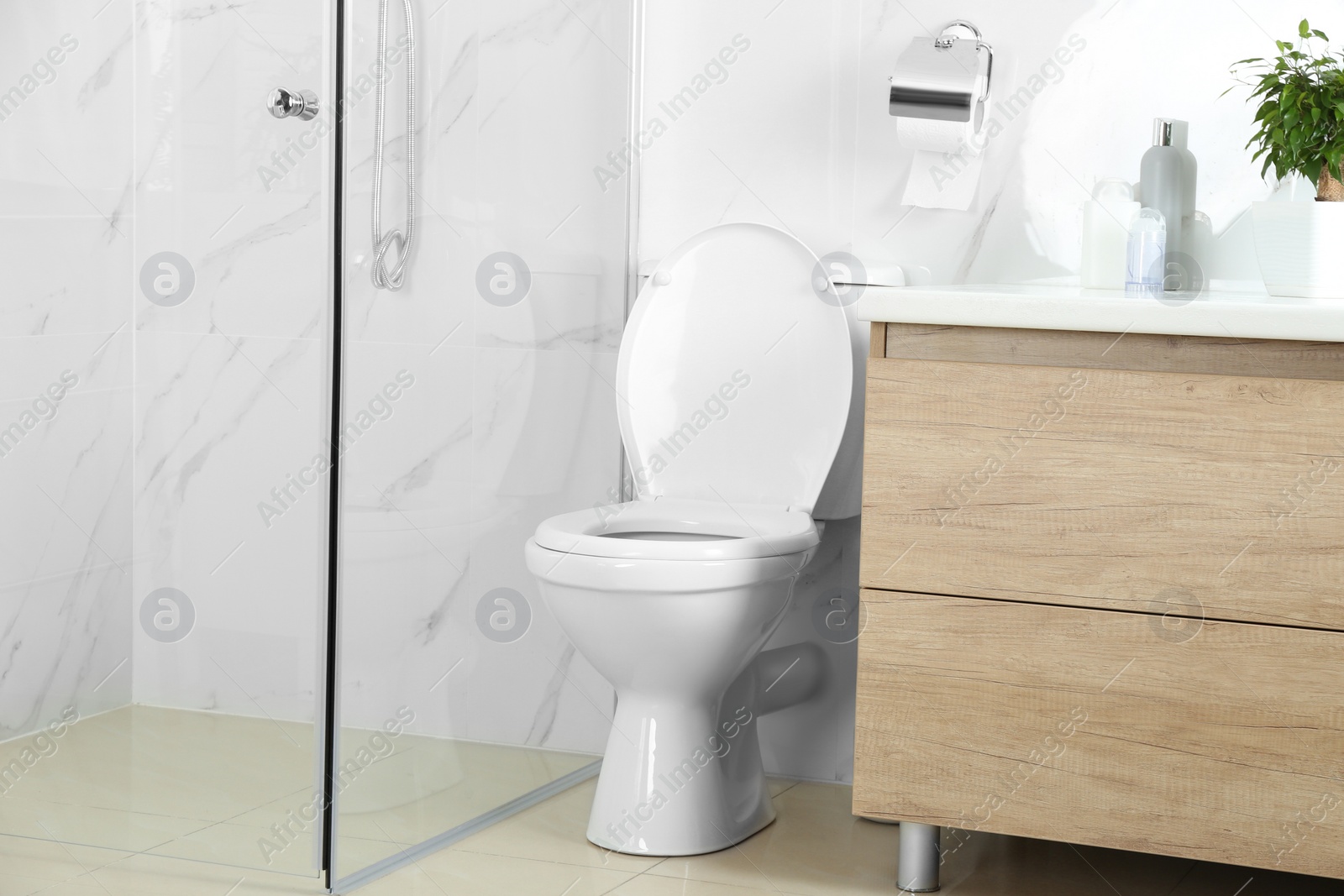 Stylish toilet bowl in modern bathroom interior Photo of Stylish toilet bowl in modern bathroom interior