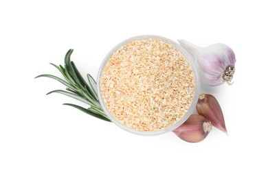 Photo of Dehydrated garlic granules in bowl, rosemary and unpeeled cloves isolated on white, top view